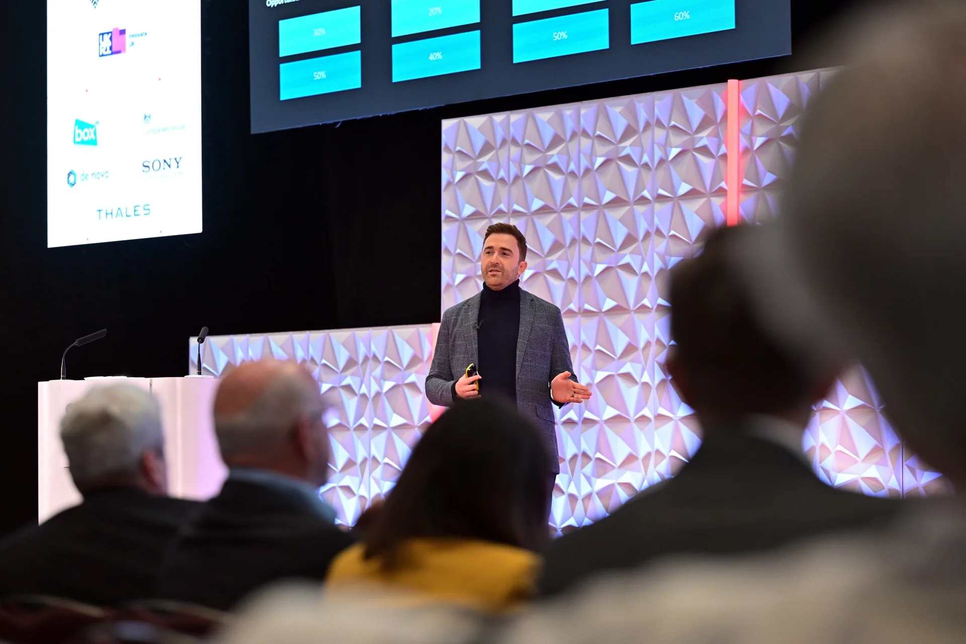 Danilo McGarry speaking on stage