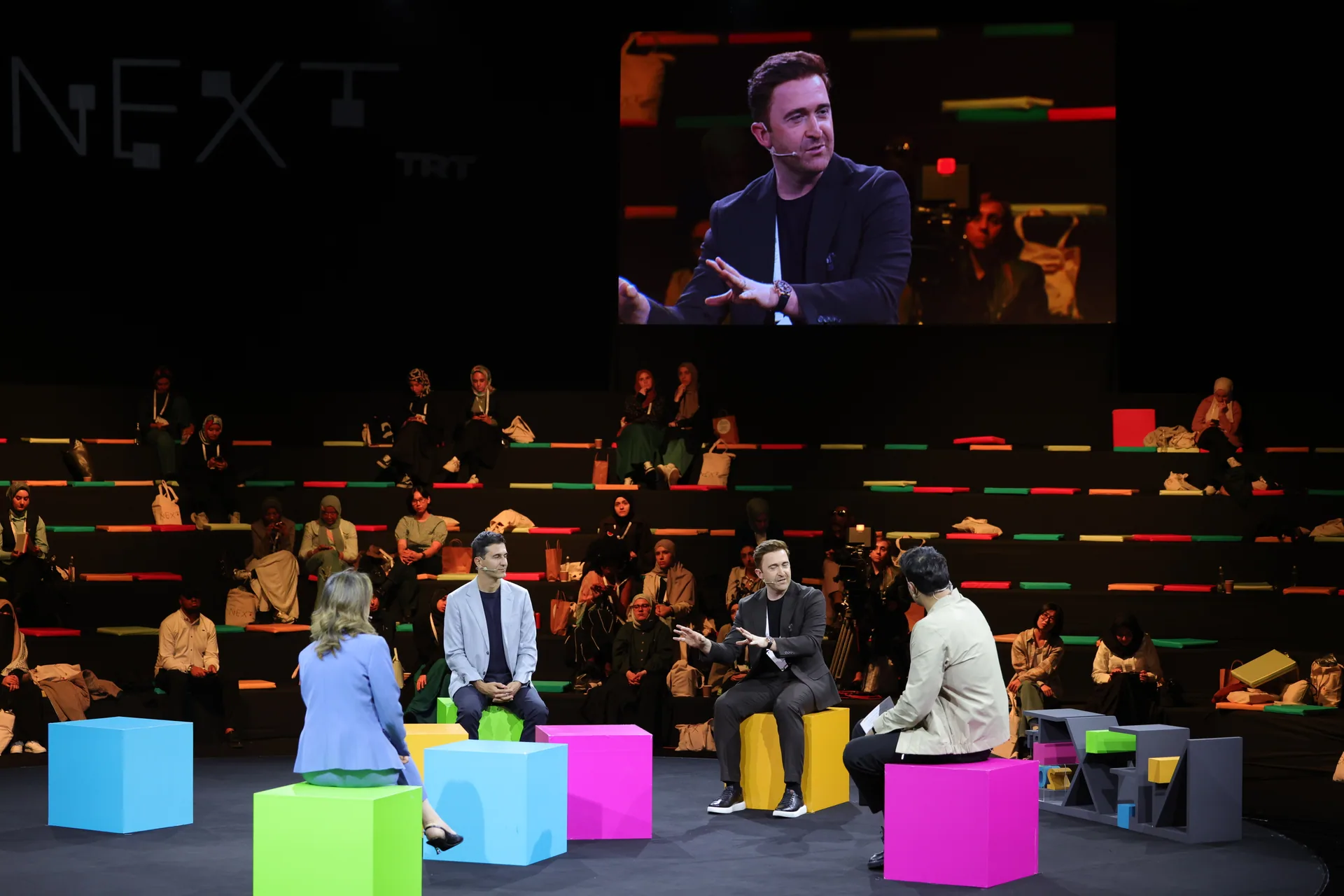 Danilo McGarry speaking on stage
